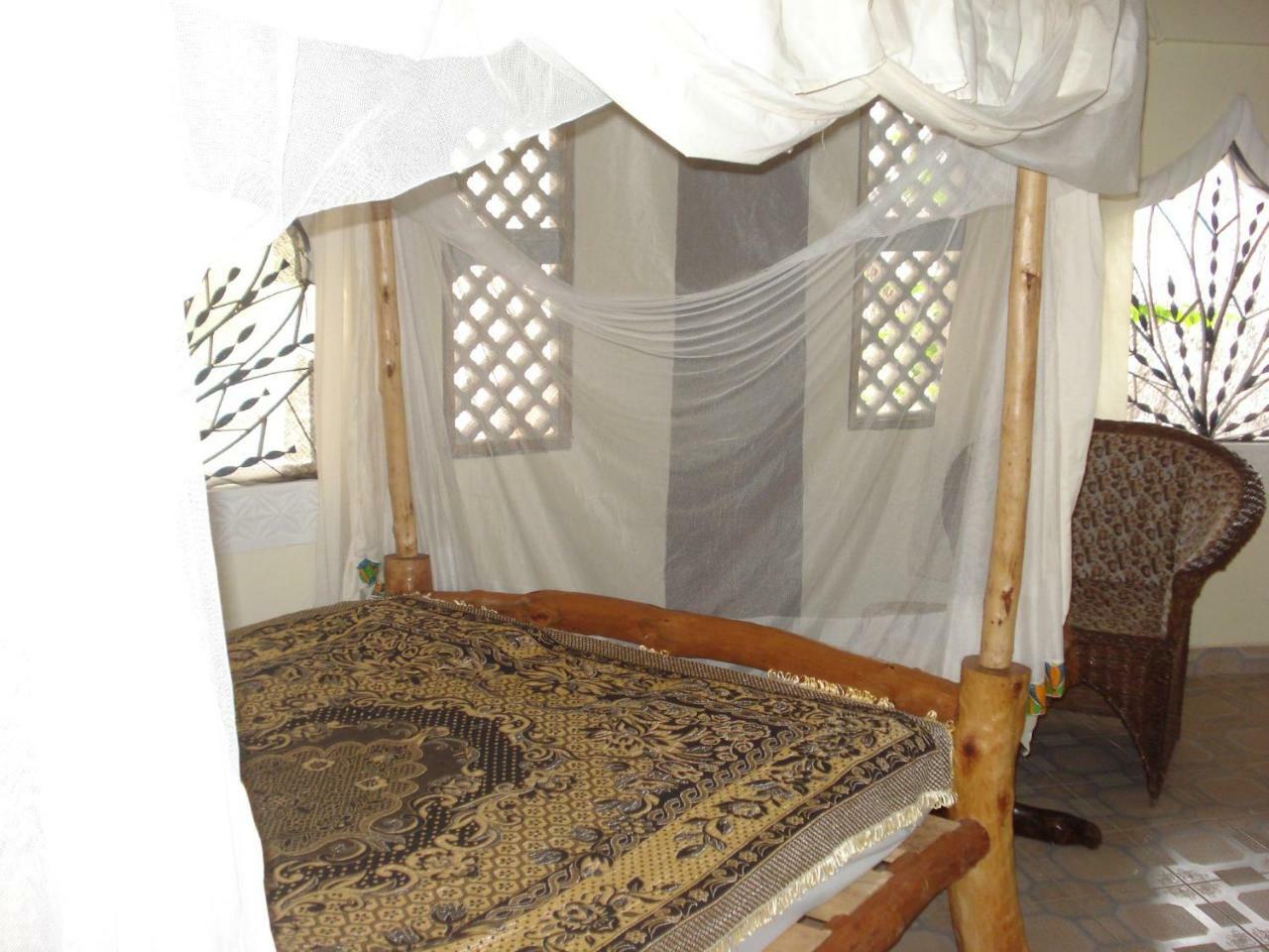 Coconut Village Beach Resort Diani Beach Quarto foto